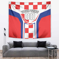 Red, white, and blue checkerboard tapestry with central shield graphic and bold text