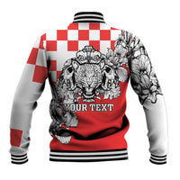 Red baseball jacket with checker sleeves and leopard-head graphic, ribbed hem
