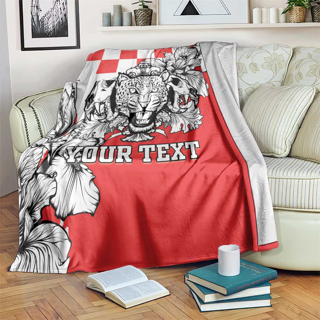 Croatia leopard heads blanket draped on couch, red/white/black lion heads and 'YOUR TEXT'