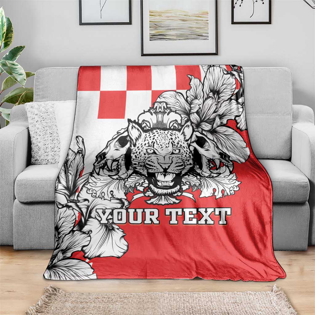 Croatia leopard heads blanket on sofa, red/white/black design with 'YOUR TEXT' lettering