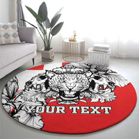 Personalized round carpet with three animal faces in black-and-white and red center, 'YOUR TEXT'