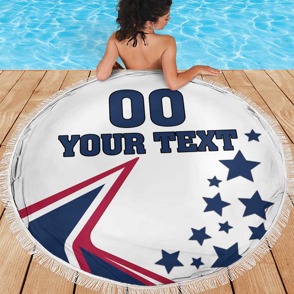 Round white beach blanket featuring “YOUR TEXT”, large 00, blue stars, and USA emblem; fringed edge.