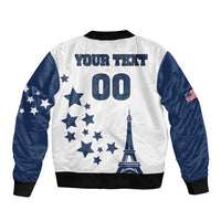 White and navy unisex bomber jacket, ribbed cuffs, zip front, stars and Eiffel Tower graphic