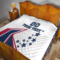 White quilt blanket on bed showing “00 YOUR TEXT” with USA stars-and-stripes graphic