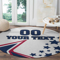Round white area rug with bold “YOUR TEXT,” blue “00” blocks, stars, and flag print