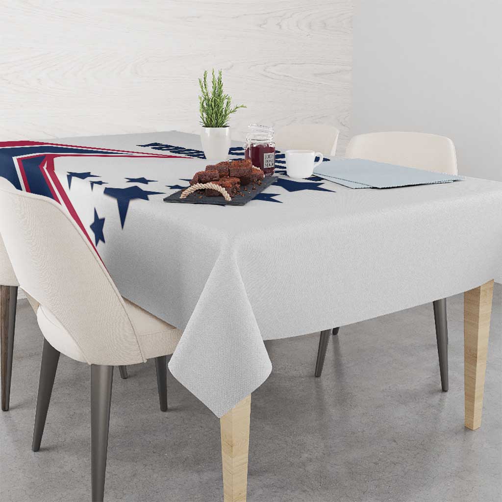 White tablecloth with patriotic blue star and red stripe print across the top