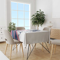 White tablecloth with patriotic stripe and star print on dining table