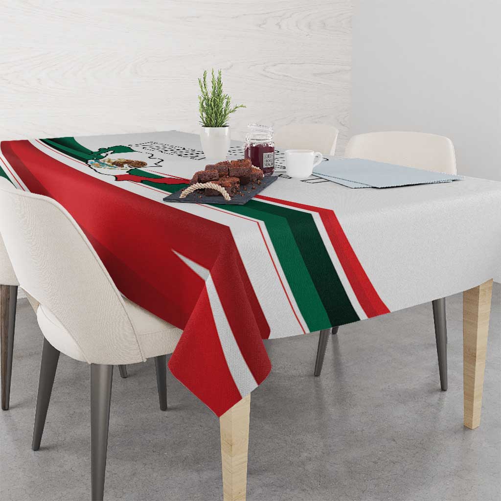 Mexico-themed tablecloth spread across dining table with red, green, white stripe print