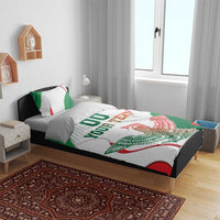 White duvet set with Mexican flag eagle print and “00 YOUR TEXT” on bed