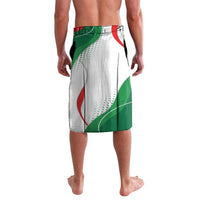 Printed lavalava wrap skirt, white with green/red diagonal flag waves; side view