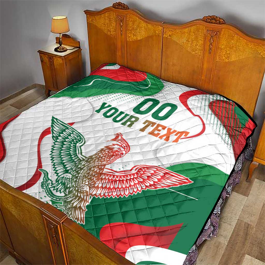 Quilt blanket with Mexican flag design, “00 YOUR TEXT” text and eagle motif, on bed