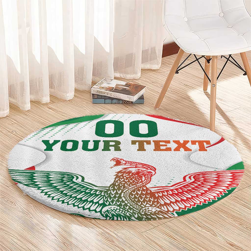 Custom round area rug with white base, “OO YOUR TEXT” and red-green eagle wings