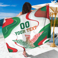 Mexico-themed white sarong with eagle emblem, green/red swirls, and 'YOUR TEXT' print