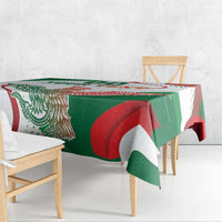 White square tablecloth with green, red, and eagle monument print over table