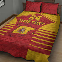 Red and yellow Spain-themed quilt with custom text and crest, shown with two pillows.