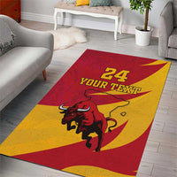 Rectangular red and yellow area rug featuring a charging bull and '24 YOUR TEXT'