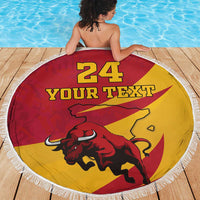 Red and yellow round beach blanket with white fringe, bull artwork, and “YOUR TEXT” text.