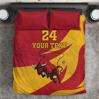 Red and yellow bedding set with bull graphic, “24” and “Your Text” on duvet and pillows