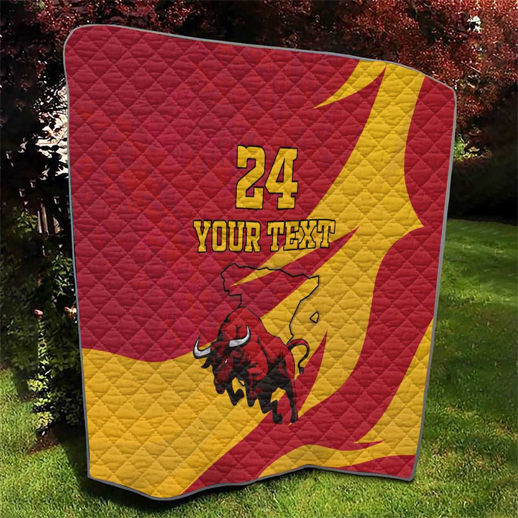 Red and yellow quilt blanket with bull graphic centered and '24 YOUR TEXT' text