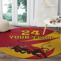 Round red and yellow rug with bull graphic and '24 YOUR TEXT' on a diagonal