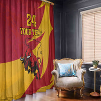Hanging window curtains in red and gold featuring bull emblem and custom text and number.