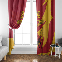 Red and gold window curtains with bull emblem, custom text, and hanging tie detail.