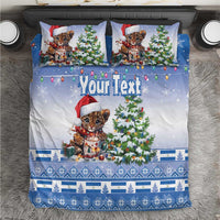 Blue Christmas bedding set with Santa-hat kitten, Christmas tree, ornaments, and patterned border