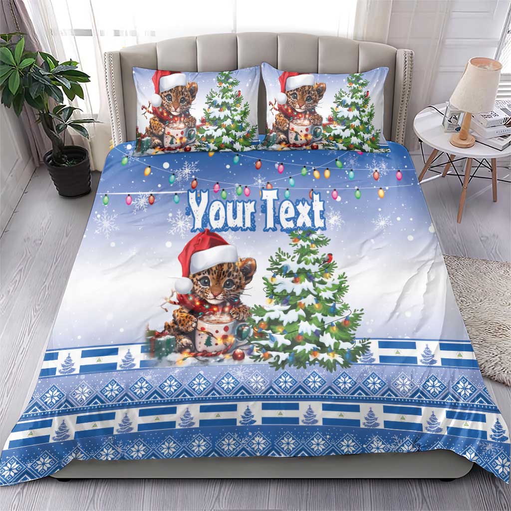 Blue Christmas bedding set with Santa-hat kitten, trees, lights and “Your Text” on the duvet