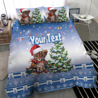 Blue Christmas duvet and pillowcases featuring a Santa-hat kitten, Christmas tree, and holiday patterns