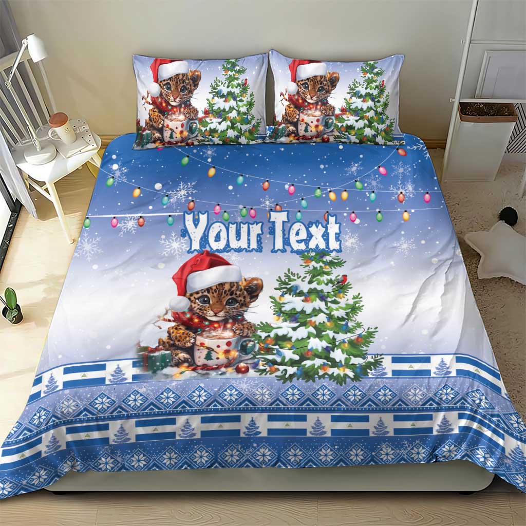 Blue Christmas bedding set with Santa-hat kitten, green tree and “Your Text” on the duvet