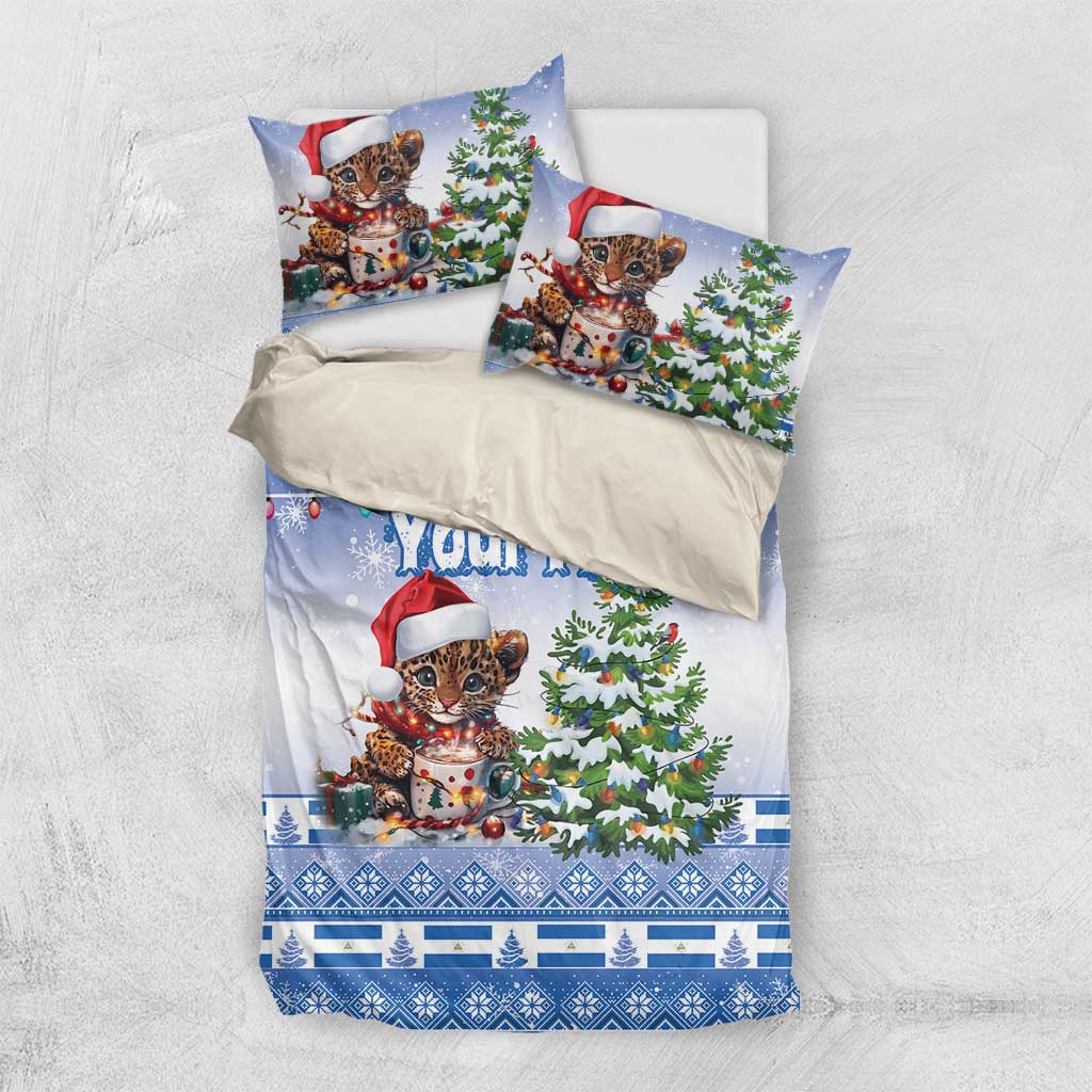 Blue Christmas duvet cover and pillowcases with Santa-hat kitten, Christmas tree, and snow motif
