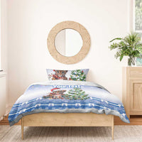 Blue Christmas duvet with Santa-hat kitten, Christmas tree, and geometric snowflake band