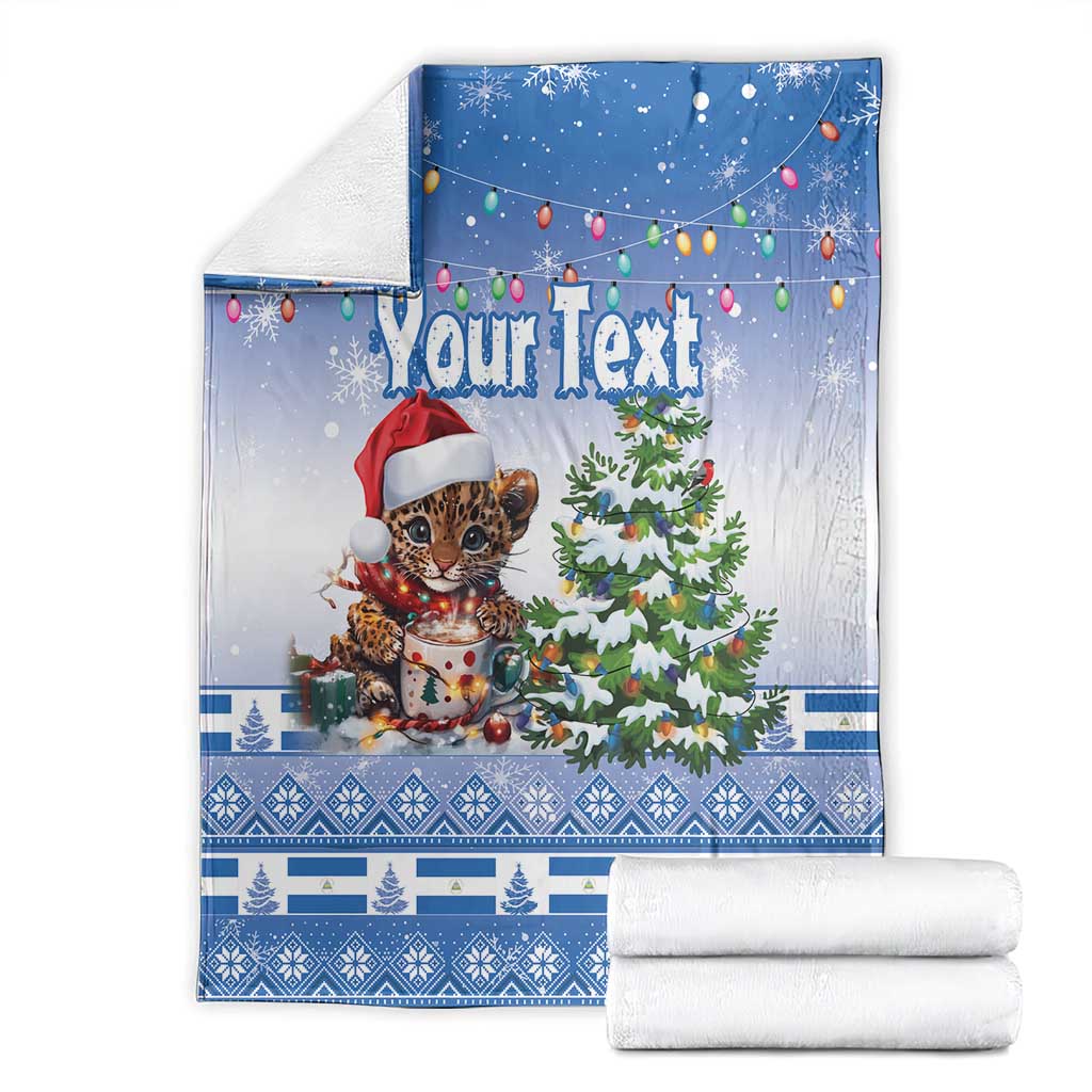 Blue Christmas blanket with “Your Text”, jaguar in Santa hat and Christmas tree; folded set