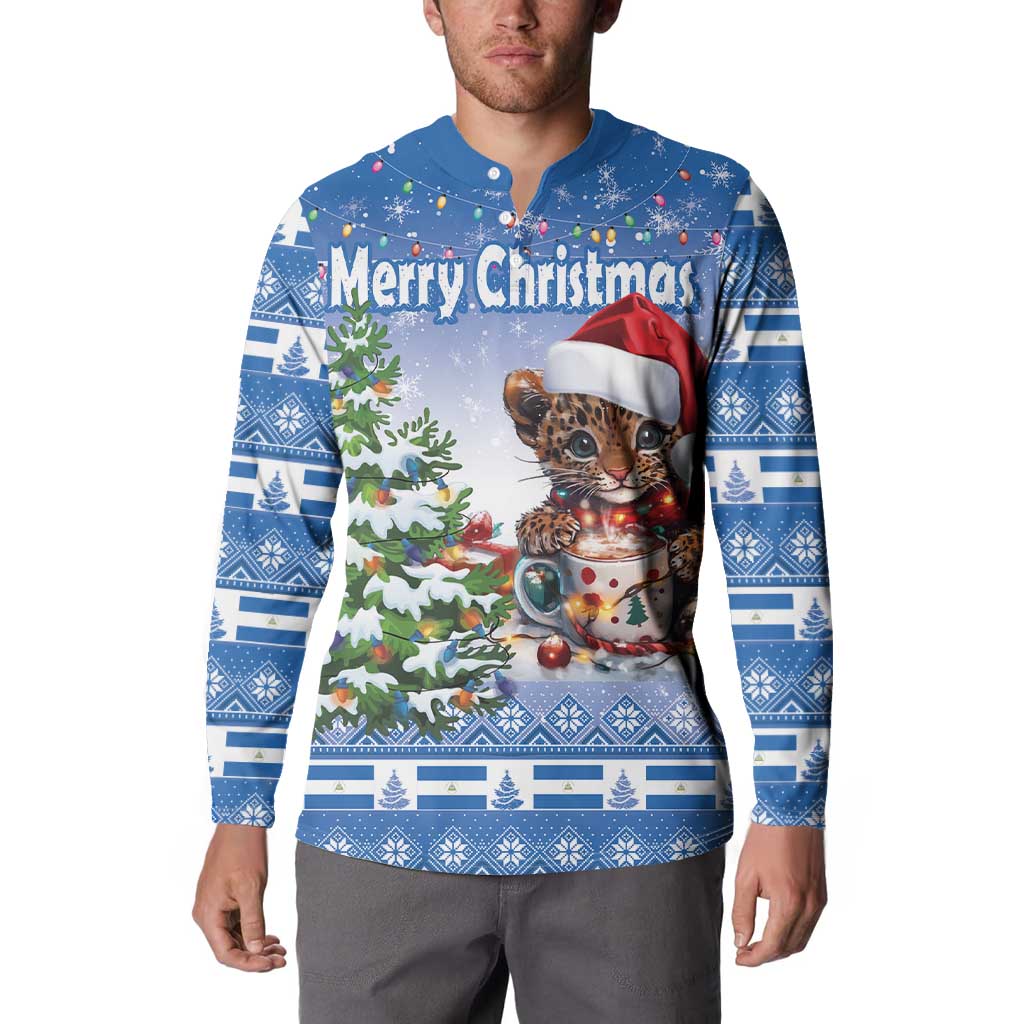 Blue Christmas button sweatshirt worn by model, wild cat graphic and 'Merry Christmas'