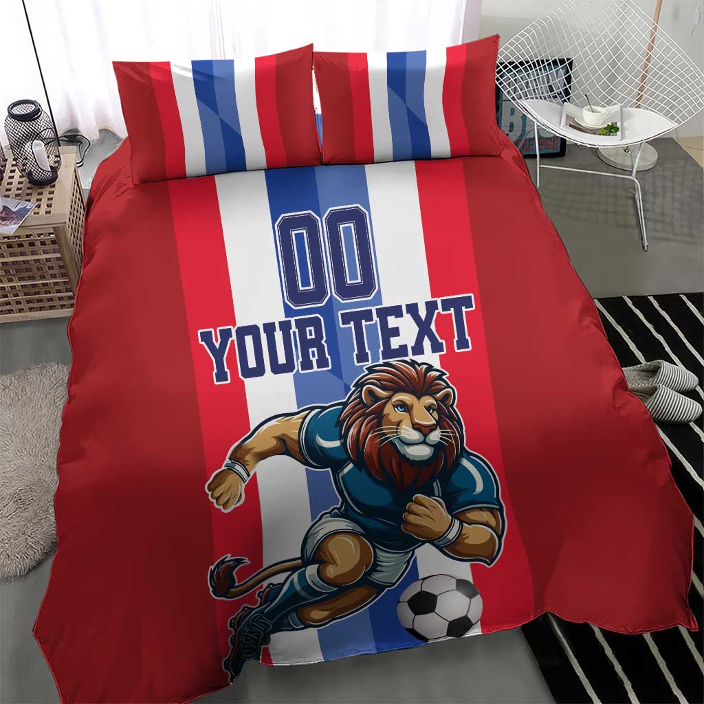 Red football bedding set with large lion soccer print and 'YOUR TEXT' on duvet and pillows.