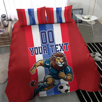 Red football bedding set with large lion soccer print and 'YOUR TEXT' on duvet and pillows.