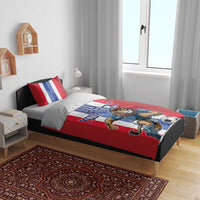 Red football bedding set with lion soccer graphic and 'YOUR TEXT' on duvet cover.
