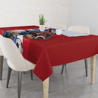 Red football tablecloth with lion and soccer ball graphic on dining table corner