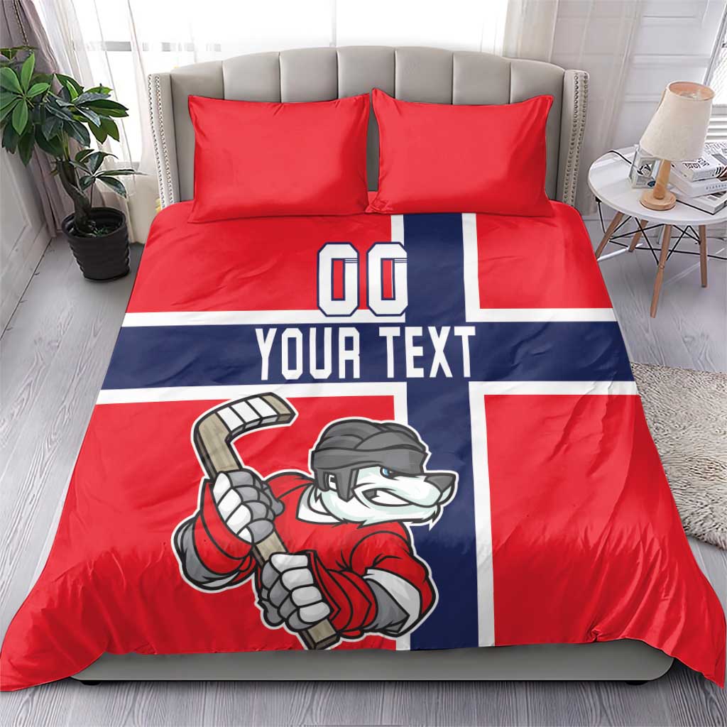 Red hockey bedding set with navy/white stripe panel, bear player graphic, two pillows on bed