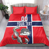 Red hockey bedding set with navy/white stripe panel, bear player graphic, two pillows on bed