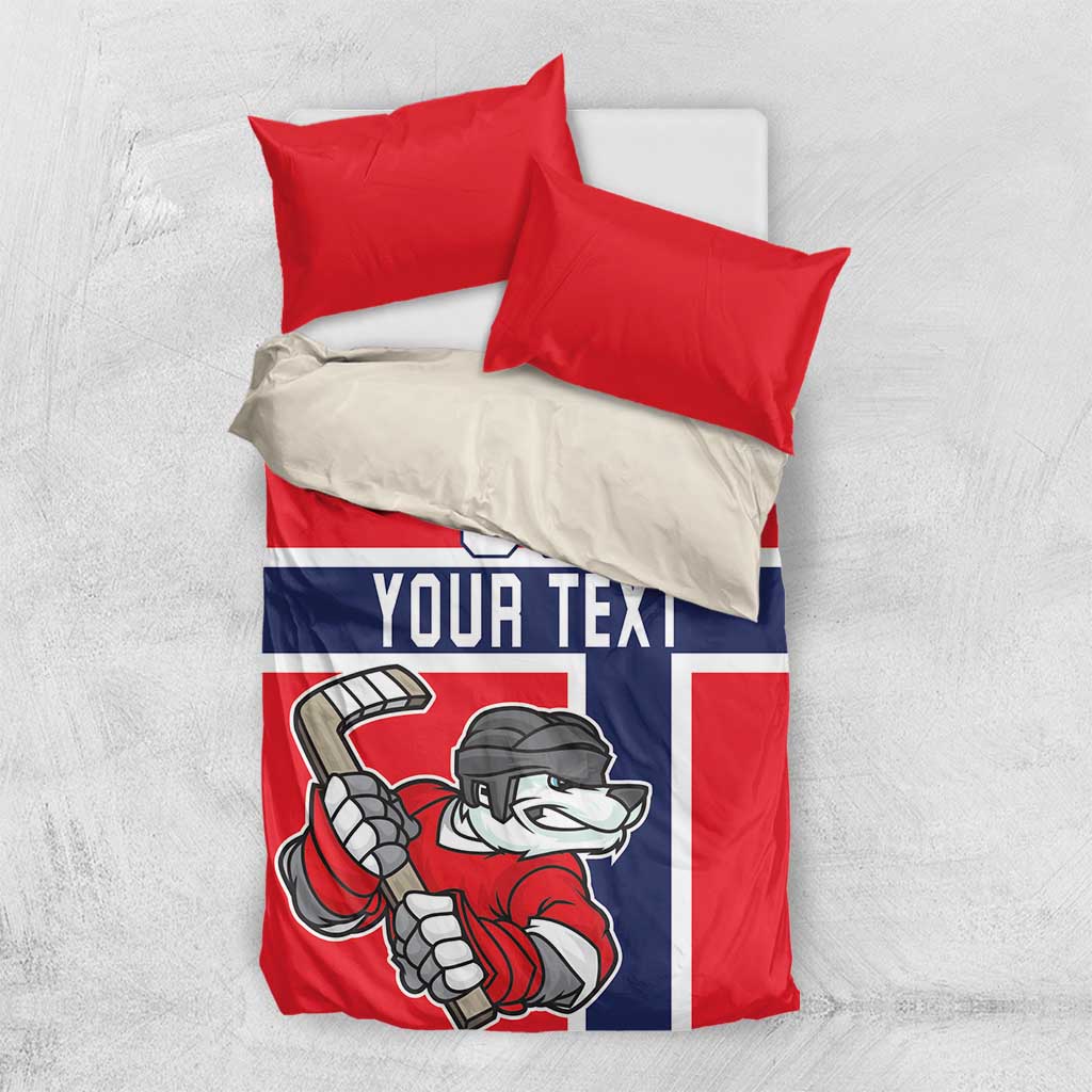 Red and navy hockey bedding set with bear player graphic, two red pillows