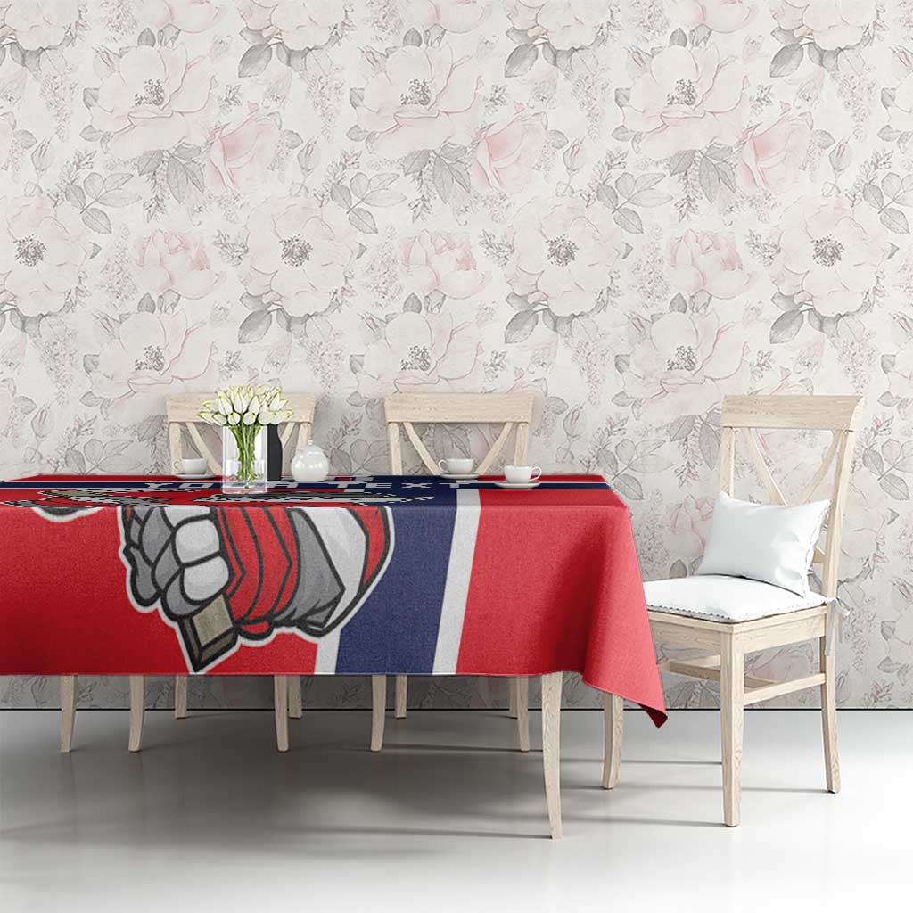 Red hockey tablecloth with polar bear goalie image and navy-and-white stripe panels on dining set