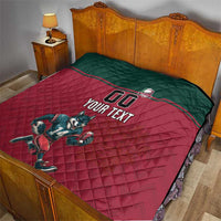 Rugby quilt laid on bed: dark green top panel, red quilted design, wolf mascot, "YOUR TEXT"
