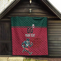Rugby quilt mounted indoors: dark green top, red quilted center, wolf graphic, "YOUR TEXT"