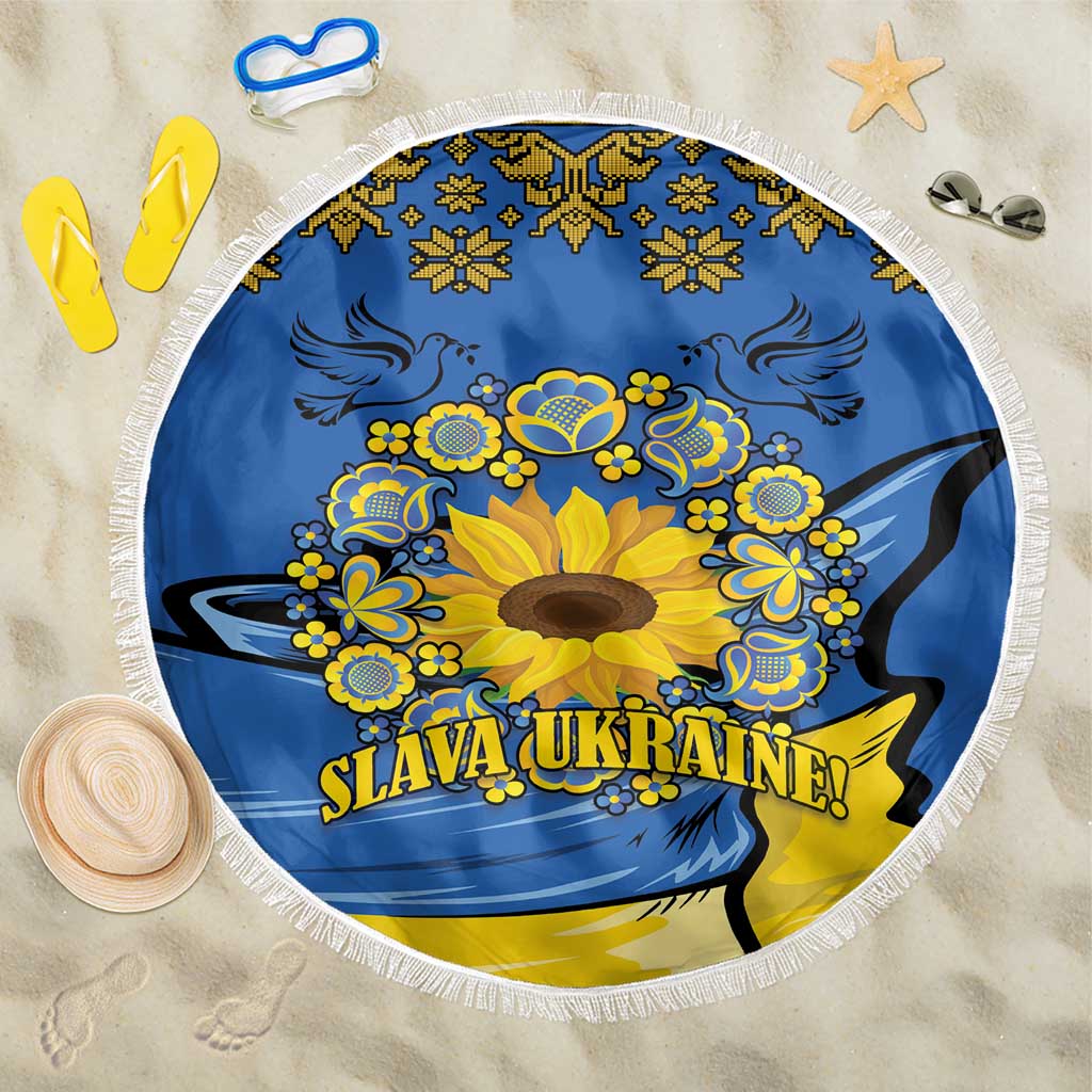 Round blue beach blanket with yellow sunflower folk print, tassel fringe edge