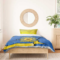 Blue and yellow duvet cover with sunflower peace sign and 'SLAVA UKRAINE!' on bed