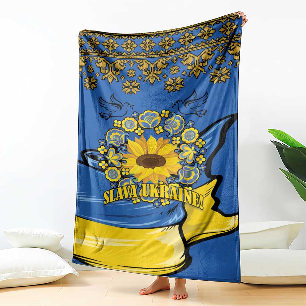 Blue and yellow folk sunflower blanket with decorative border and “SLAVA UKRAINE!”