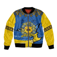 Unisex blue and yellow bomber jacket with folk patterns, zipper front, ribbed hem