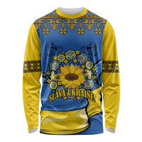 Unisex long-sleeve shirt, blue with yellow folk border and sunflower peace graphic