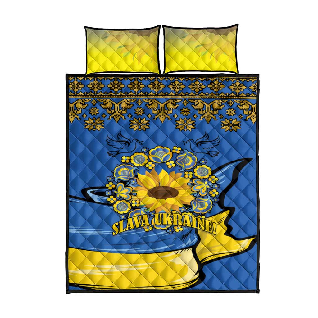 Blue quilt and yellow pillowcases with folk border, sunflower peace sign artwork